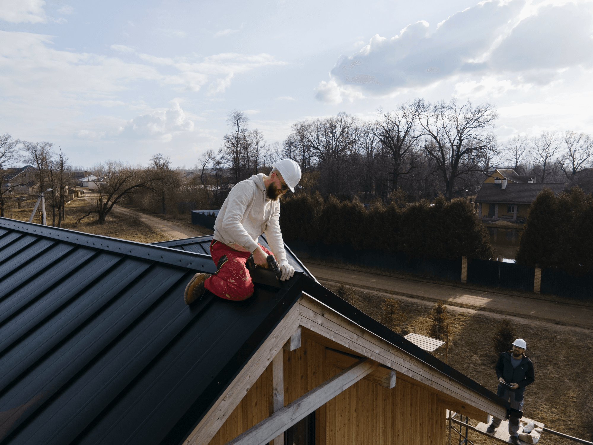an overhead shot of a roofing contractor at work