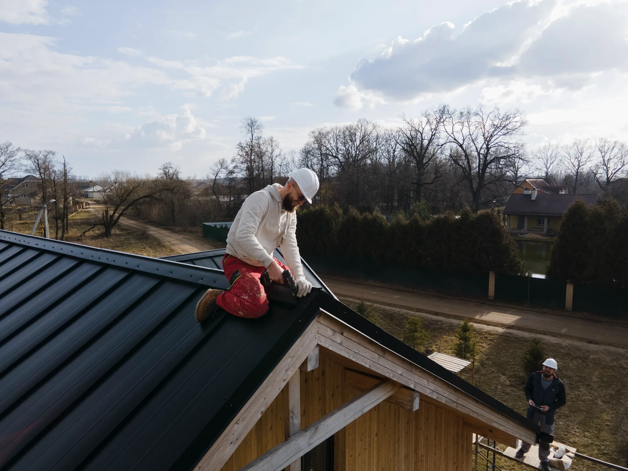 an overhead shot of a roofing contractor at work
