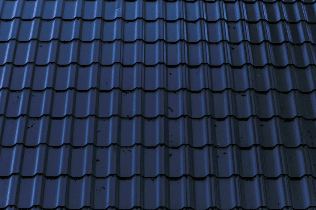 Bright blue commercial roof showcasing the benefits of regular roof maintenance.