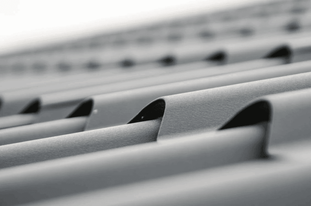Close-up of a gray metal roof on a commercial building.