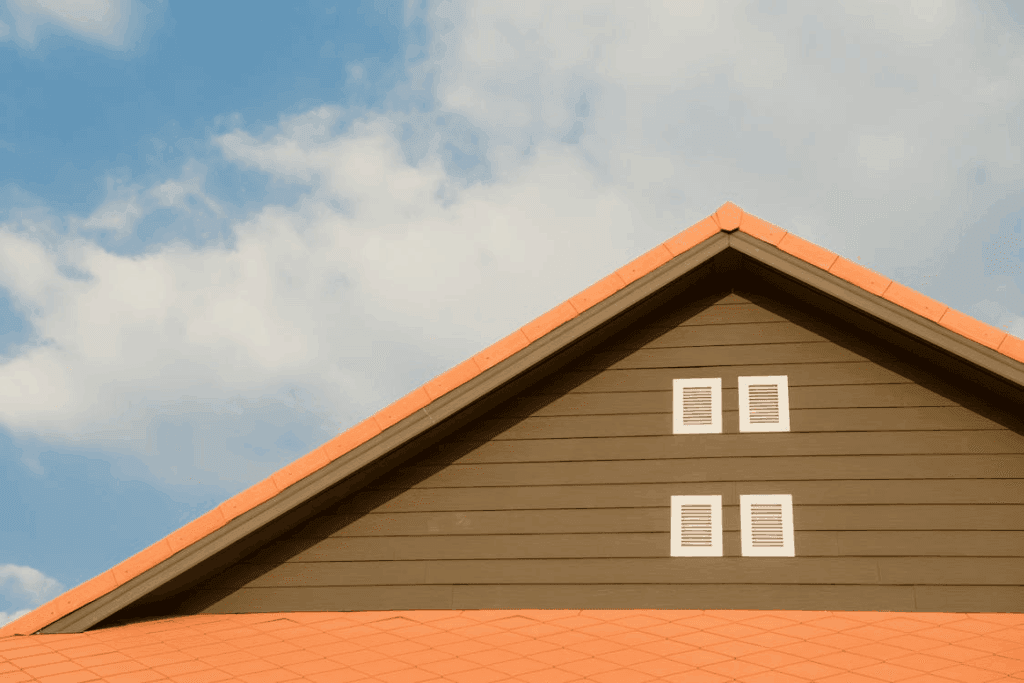 A freshly laid roof showing strong storm damage, with roof restoration work done by professional roofers.