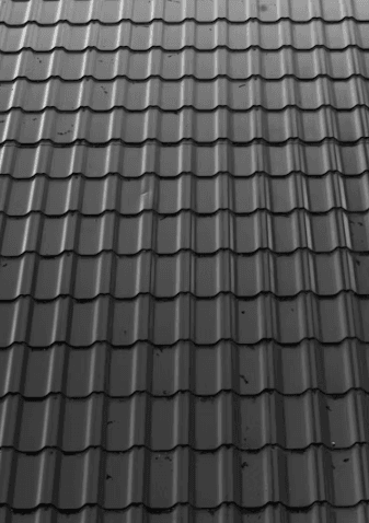 This image shows a sleek metal roofing surface.