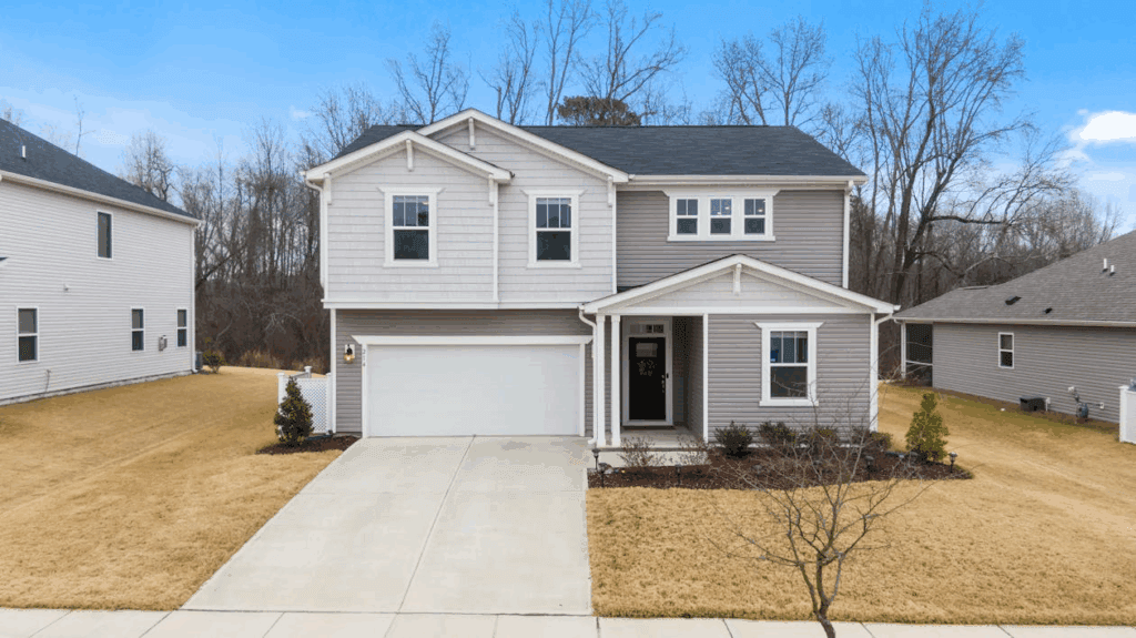 An image of a house with a garage.
